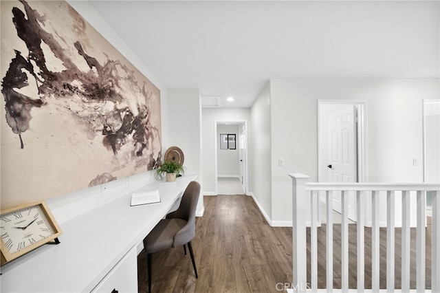 hall with hardwood / wood-style flooring