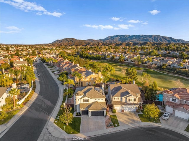 birds eye view of property featuring a mountain view