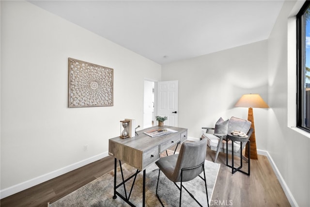 home office featuring hardwood / wood-style floors