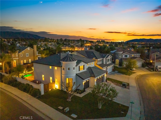 aerial view at dusk with a mountain view