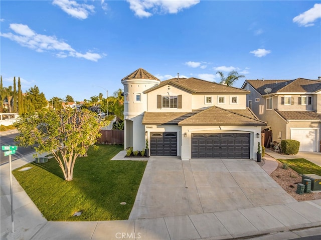 view of front of property featuring a garage and a front lawn