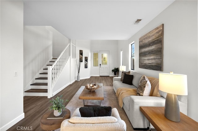 living room featuring dark hardwood / wood-style floors