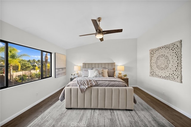 bedroom with lofted ceiling, wood-type flooring, and ceiling fan