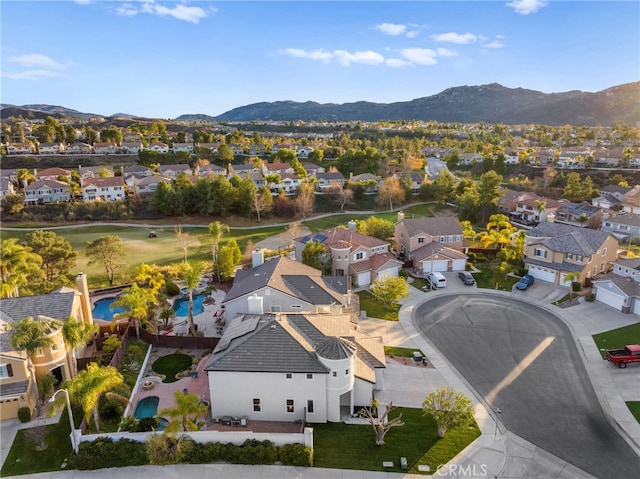 bird's eye view with a mountain view