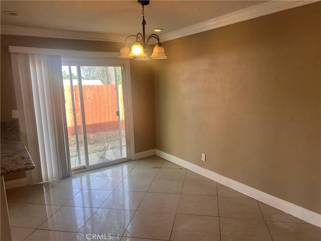 unfurnished room featuring light tile patterned floors, ornamental molding, baseboards, and a notable chandelier