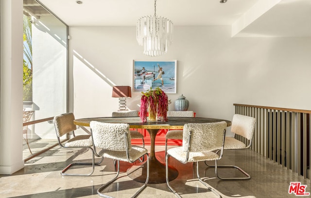 dining area featuring a chandelier