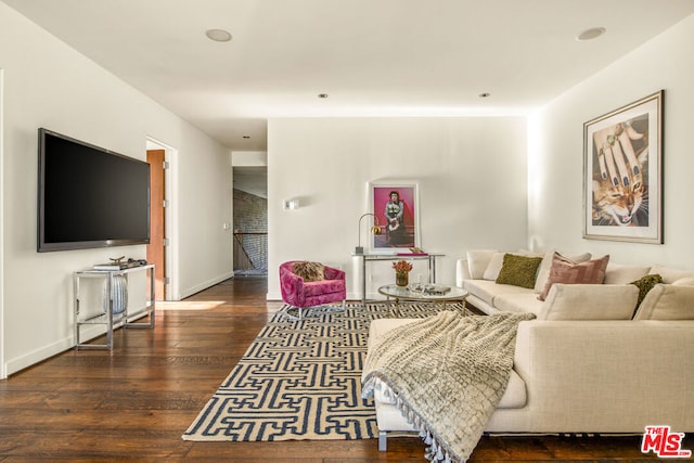 living room with dark wood-type flooring