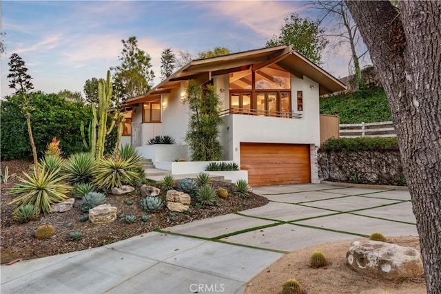 view of front of property featuring a garage