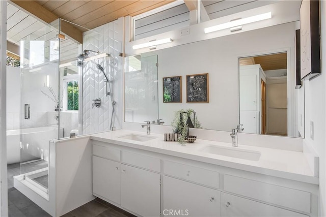 bathroom with walk in shower, wood ceiling, and vanity