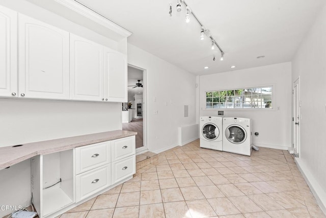 clothes washing area featuring ceiling fan, light tile patterned floors, and washing machine and dryer