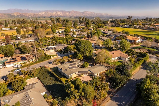 bird's eye view featuring a residential view and a mountain view