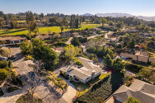 drone / aerial view featuring a mountain view and a residential view