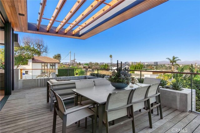 wooden terrace with a pergola