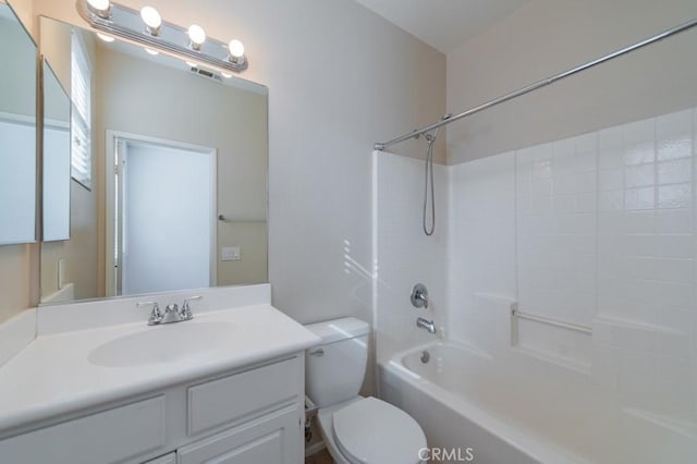 full bathroom with vanity, shower / bathtub combination, and toilet