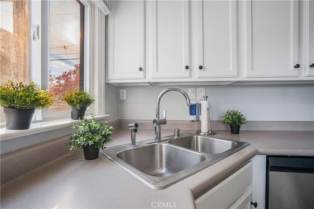 kitchen with sink and white cabinets