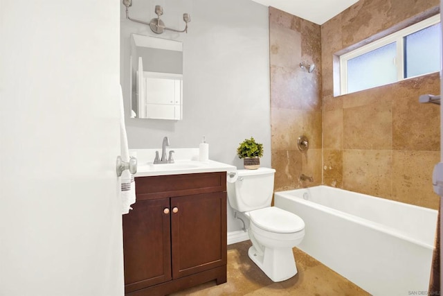 full bathroom featuring toilet, tiled shower / bath, and vanity