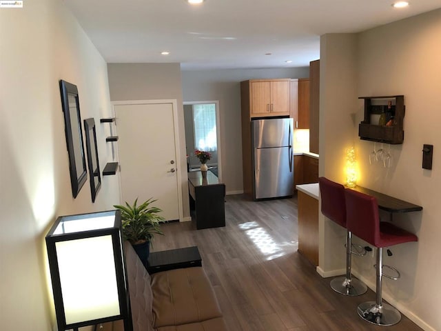 interior space with dark hardwood / wood-style flooring