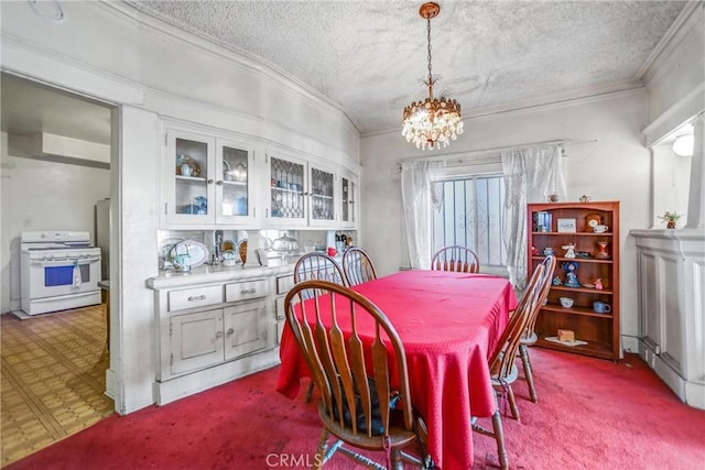 dining room with crown molding, light colored carpet, a chandelier, and a textured ceiling