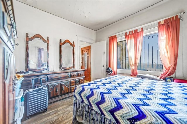 bedroom featuring hardwood / wood-style floors