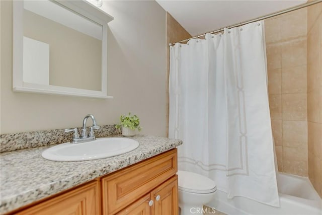 full bathroom with toilet, shower / bath combination with curtain, and vanity