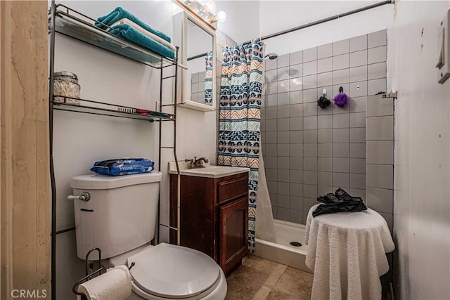 bathroom featuring vanity, toilet, curtained shower, and tile patterned flooring