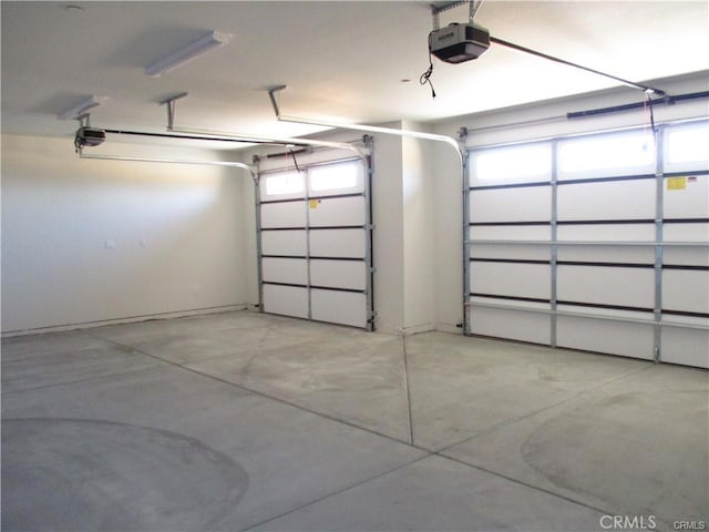 garage featuring a garage door opener