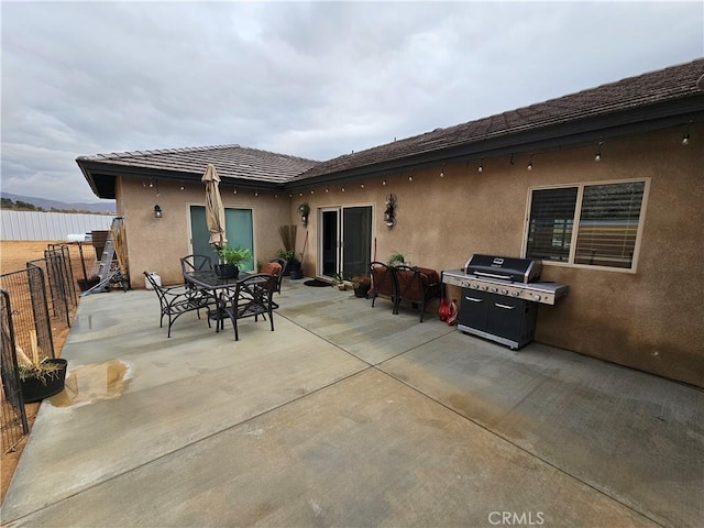 rear view of house with a patio area