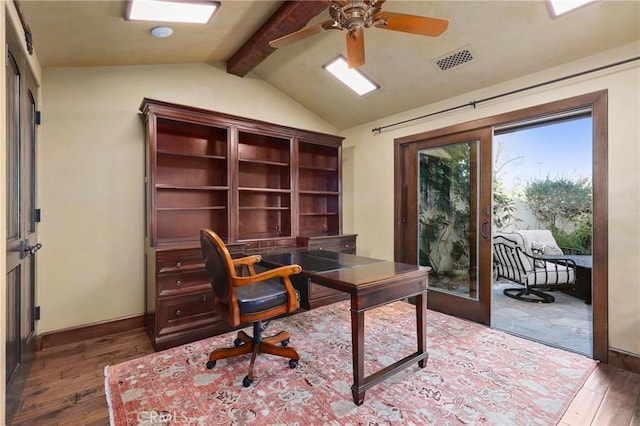 office featuring ceiling fan, dark hardwood / wood-style flooring, and vaulted ceiling with beams