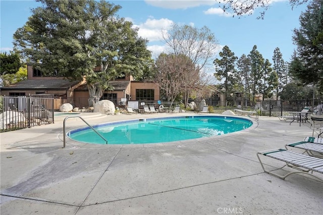 view of pool featuring a patio area