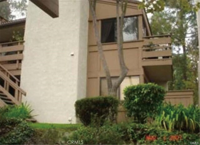 22848 Hilton Head Dr Unit 179, Diamond Bar, CA 91765 - view of property exterior featuring a balcony and stucco siding