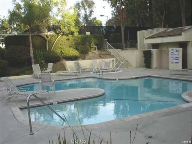 view of pool with a patio area