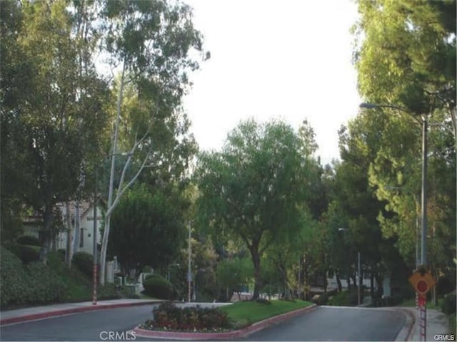 22848 Hilton Head Dr Unit 179, Diamond Bar, CA 91765 - view of street with street lighting, curbs, and traffic signs