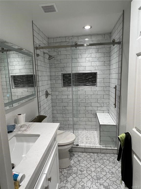 22848 Hilton Head Dr Unit 179, Diamond Bar, CA 91765 - bathroom with visible vents, vanity, toilet, recessed lighting, and a shower stall