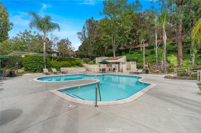 22848 Hilton Head Dr Unit 179, Diamond Bar, CA 91765 - community pool featuring a patio and view of scattered trees