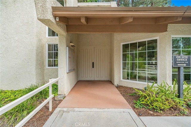 22848 Hilton Head Dr Unit 179, Diamond Bar, CA 91765 - doorway to property with stucco siding