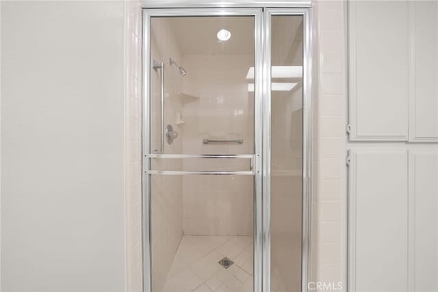 bathroom with an enclosed shower