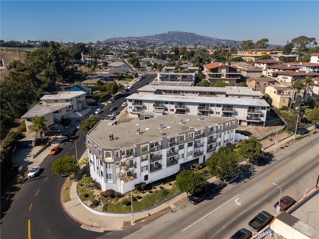 drone / aerial view featuring a mountain view