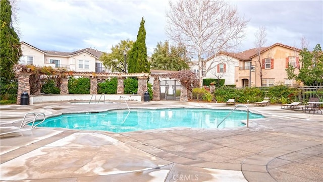 view of swimming pool featuring a patio