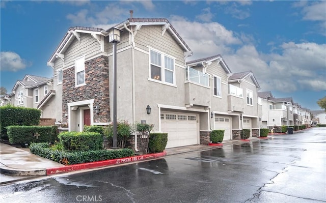 view of side of property featuring a garage