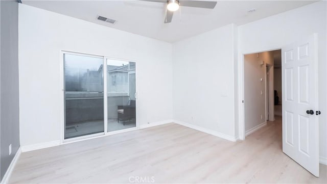 unfurnished room with ceiling fan and light hardwood / wood-style flooring