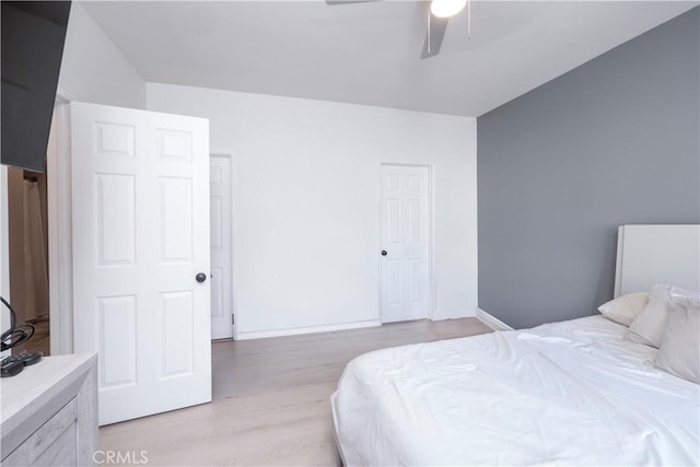 7331 Shelby Pl Unit U56, Rancho Cucamonga, CA 91739 - bedroom with light wood-style floors, baseboards, and ceiling fan