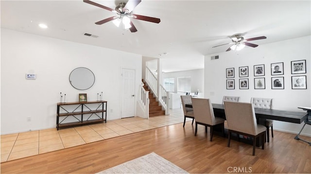 dining area featuring ceiling fan and light hardwood / wood-style floors