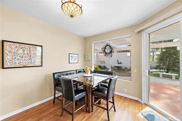 dining area with light wood-type flooring