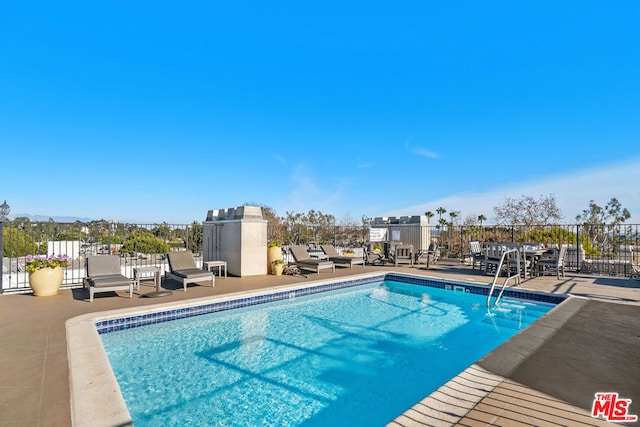 view of pool with a patio