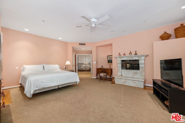 carpeted bedroom featuring ceiling fan