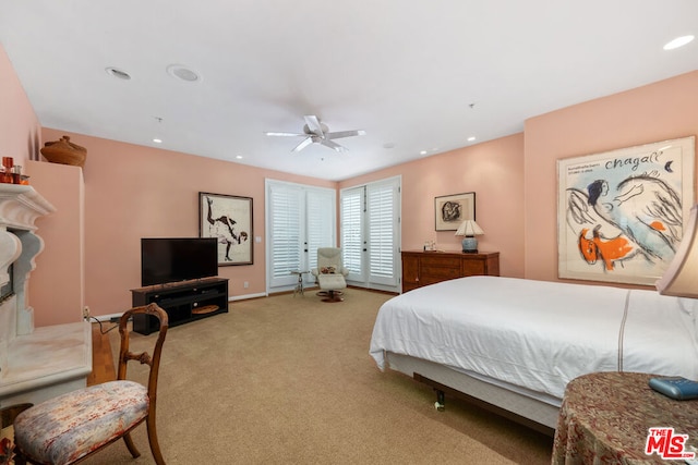 bedroom with ceiling fan and carpet floors