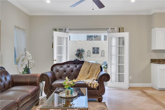 tiled living room with crown molding and ceiling fan