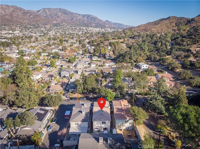 drone / aerial view featuring a mountain view