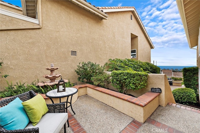 view of patio / terrace featuring a grill