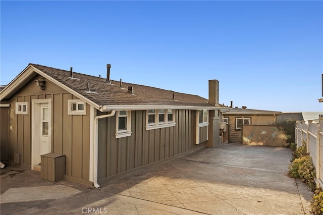 150 Cress St, Laguna Beach, CA 92651 - back of house featuring board and batten siding, fence, and a patio